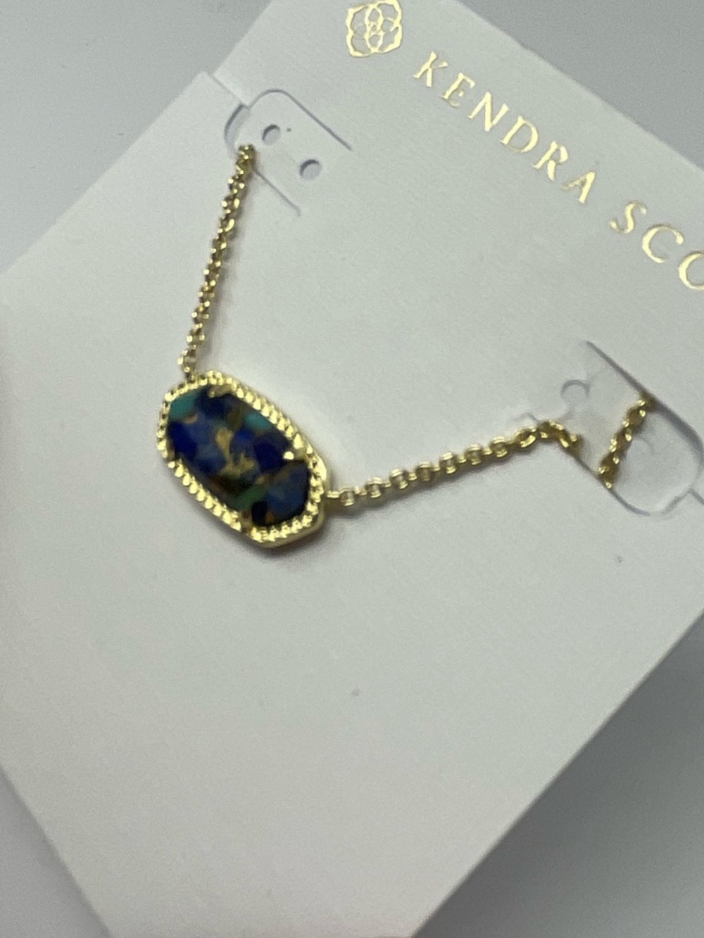Sydney Hold - Kendra Scott Gold Necklace with Blue & Green Tort Elle Pendant